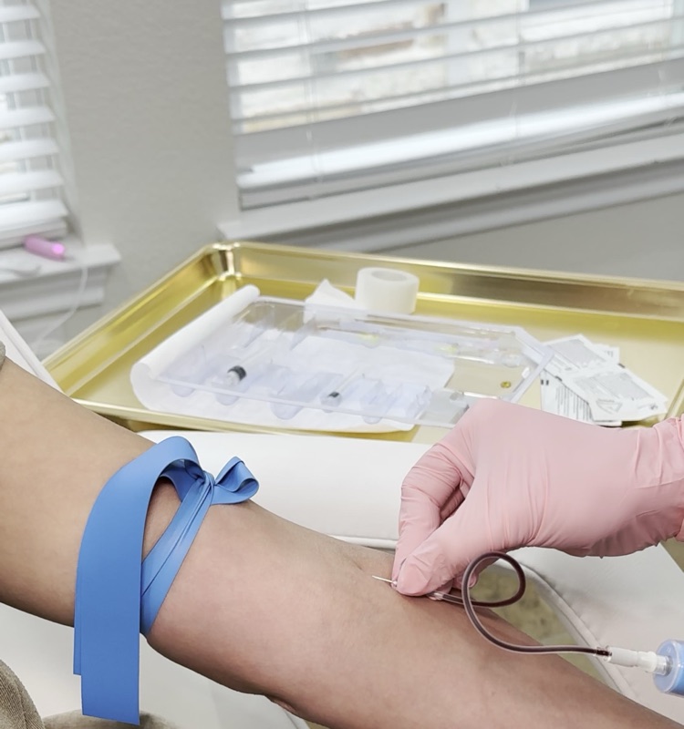 Blood draw with tourniquet for PRP therapy at Chan Ramos MedSpa